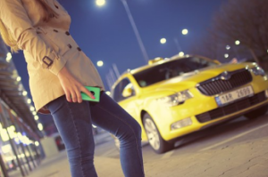 woman waiting for a cab